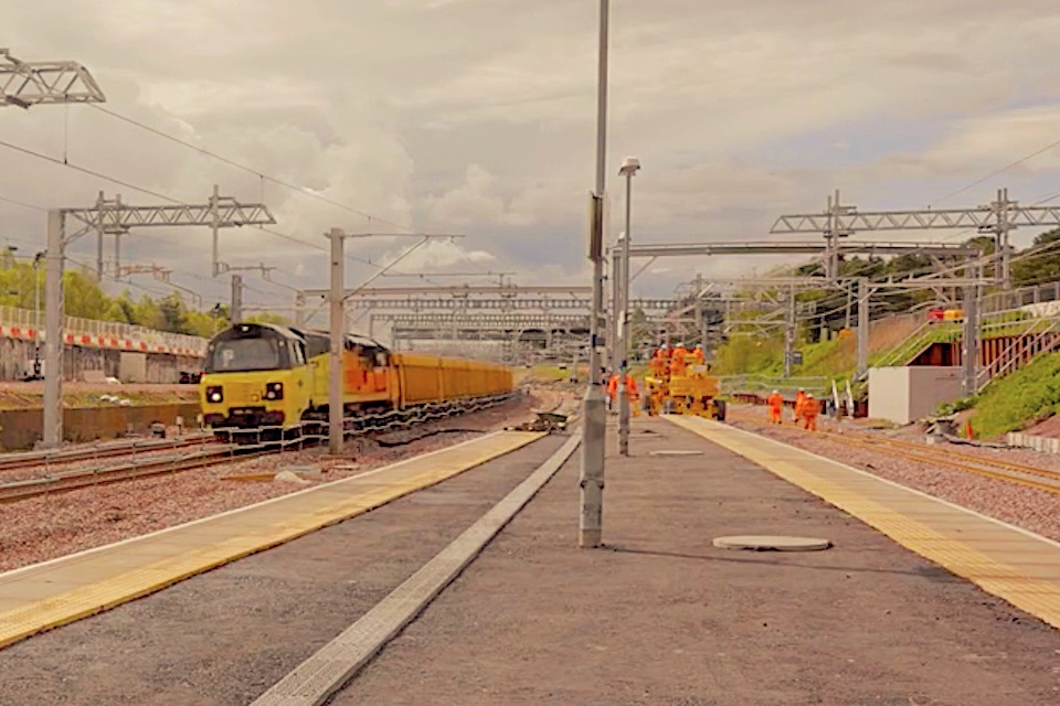 Colas engineering train passes the new platforms at Carstairs Junction in Scotland